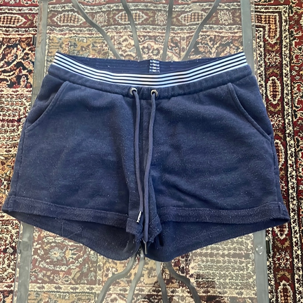 Blue booty shorts with pockets on back